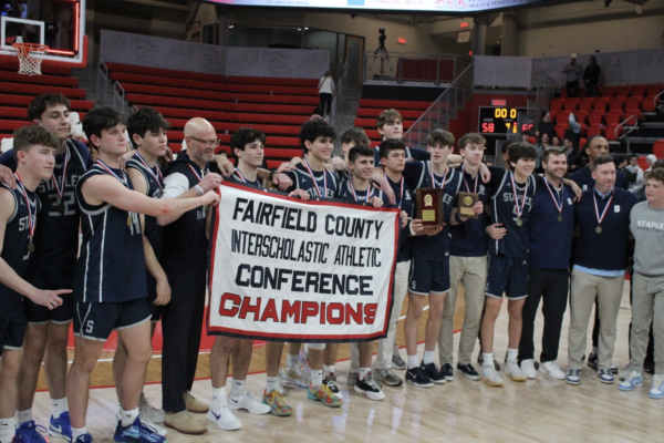 The Staples Wreckers beat the Ridgefield Tigers 68-58 to win the 2024-2025 FCIAC Championship.